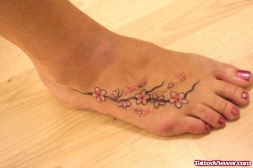 Attractive Cherry Blossom Flowers Foot Tattoo