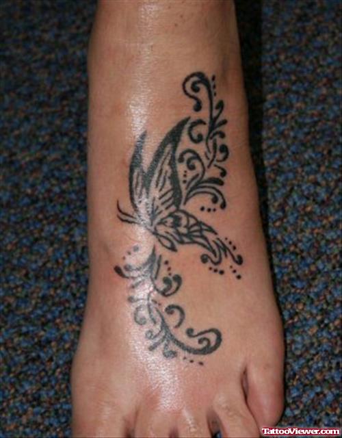 Black Ink Swirl Butterfly Foot Tattoo