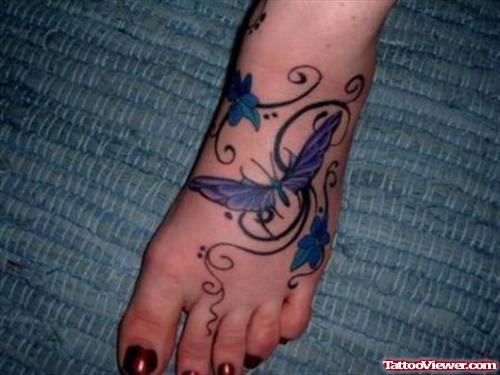 Awesome Colored Butterflies Foot Tattoo For Girls