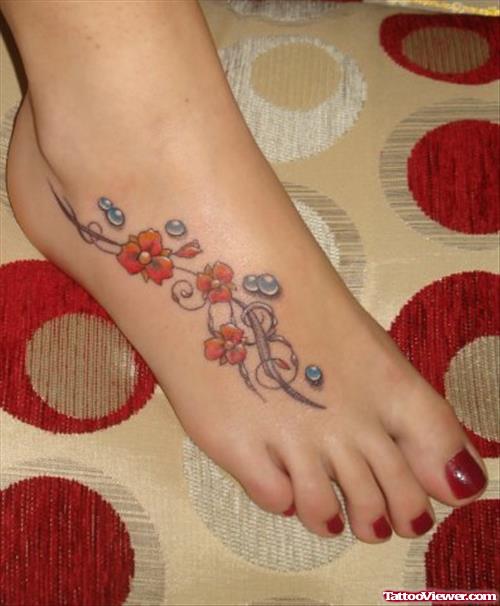 Small Flowers Tattoos On Right Foot