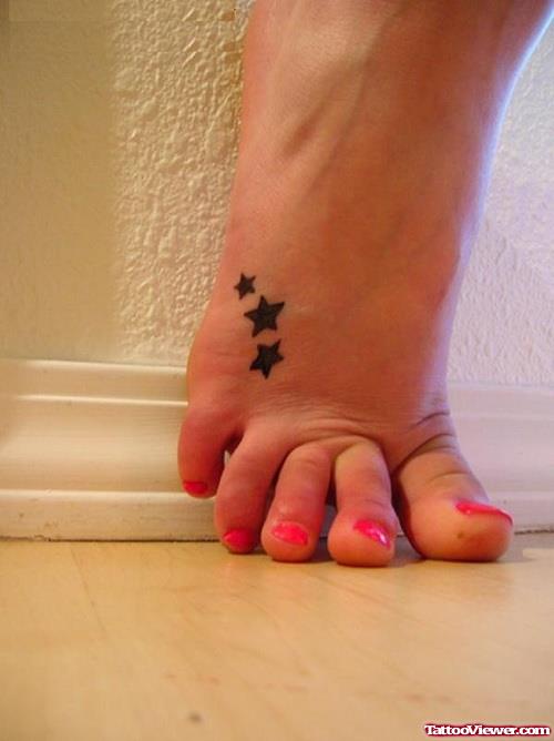 Tiny Black Stars Foot Tattoo For Girls
