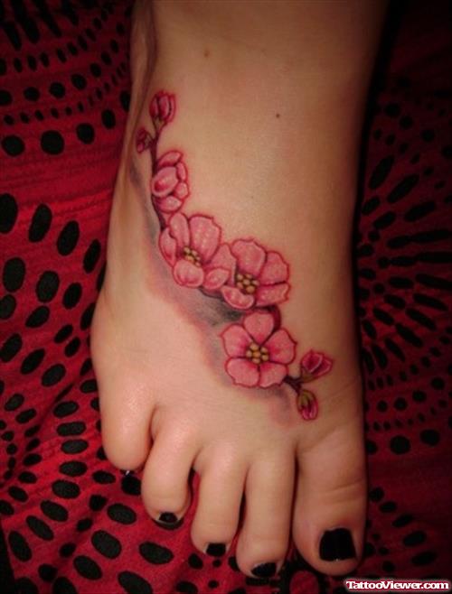 Pink Flowers Tattoos On Girl Right Foot