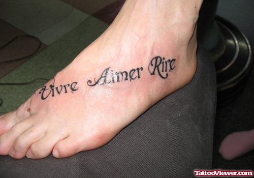 French Lettering Tattoo On Left Foot