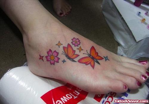 Flowers And Butterflies Tattoos on Girl Right Foot