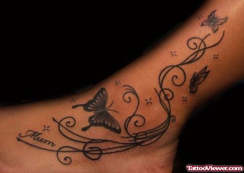 Grey Ink Swirl And Butterflies Foot Tattoo
