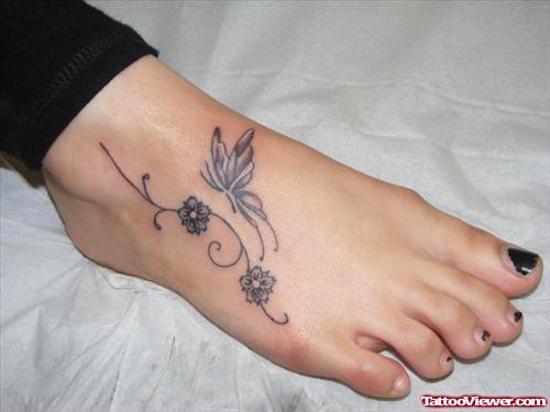 Grey Ink Flowera and Butterfly Foot Tattoo