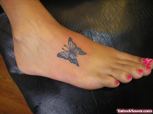 Girl With Butterfly Foot Tattoo