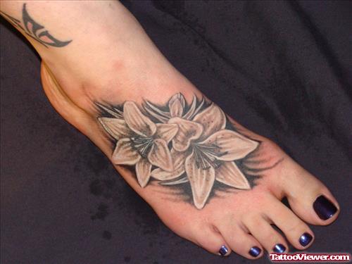 Grey Ink Flowers Tattoo On Right Foot