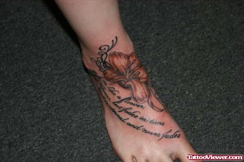 Color Flower And Lettering Foot Tattoo