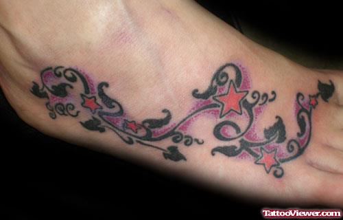 Black Ink Tribal And Red Stars Foot Tattoo