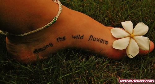 Among The Wild Flowers Tattoo On Left Foot
