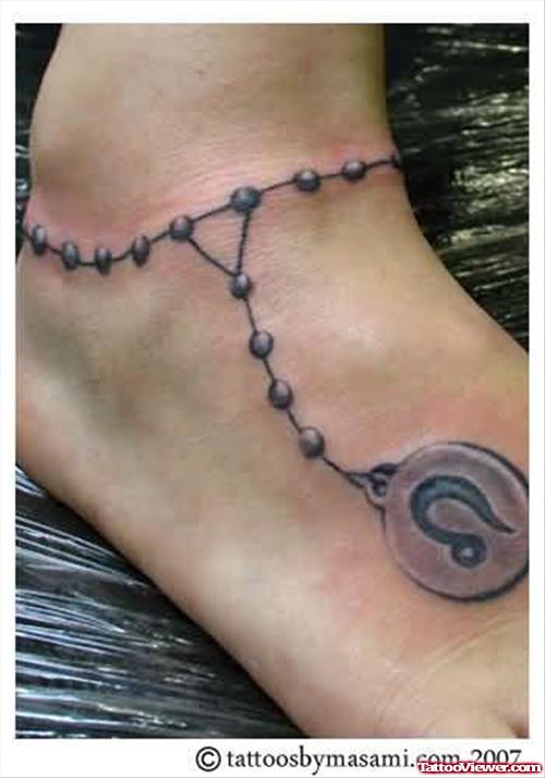 Rosary Bead Foot Tattoo