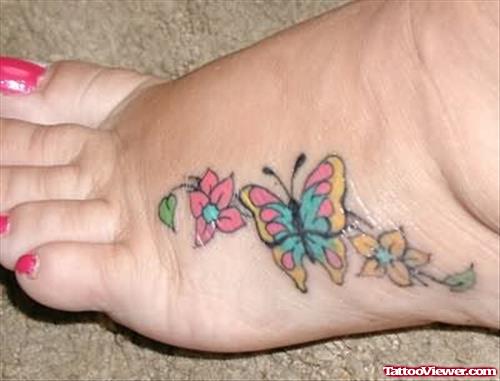 Butterfly Coloured Ink Foot Tattoo