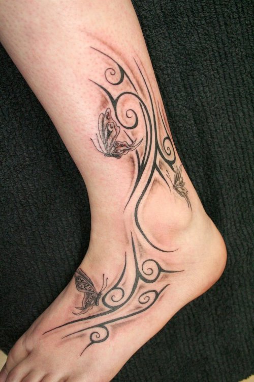 Best Tribal And Butterfly Foot Tattoo