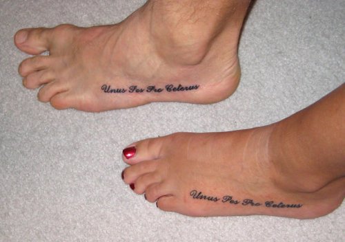 Awesome Lettering Tattoo On Girl Left Foot