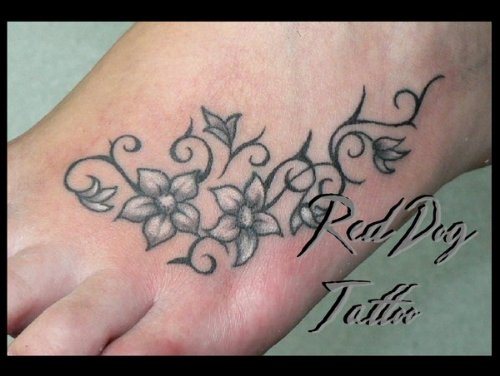 Grey Ink Flower and Tribal Foot Tattoo