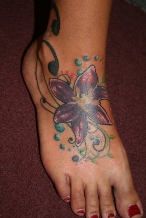 Purple Flower Tattoo On Girl Right Foot