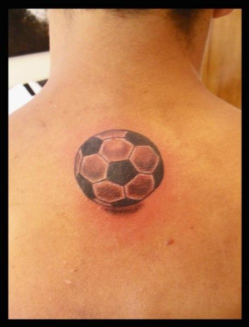 Grey Ink Football Tattoo On Upperback