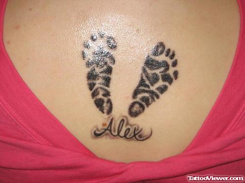 Alex Footprints tattoo On Back