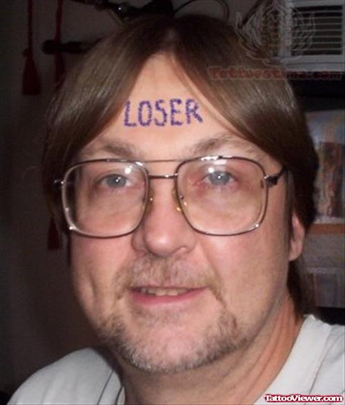 Loser Forehead Tattoo