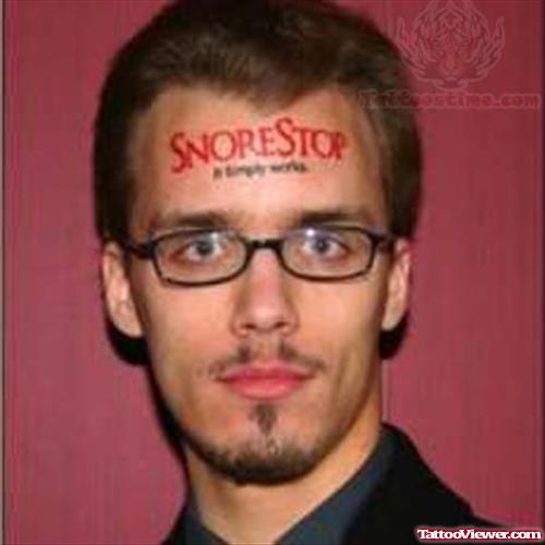 Snore Stop Tattoo On Forehead