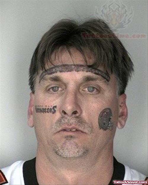 Helmate And Forehead Tattoo