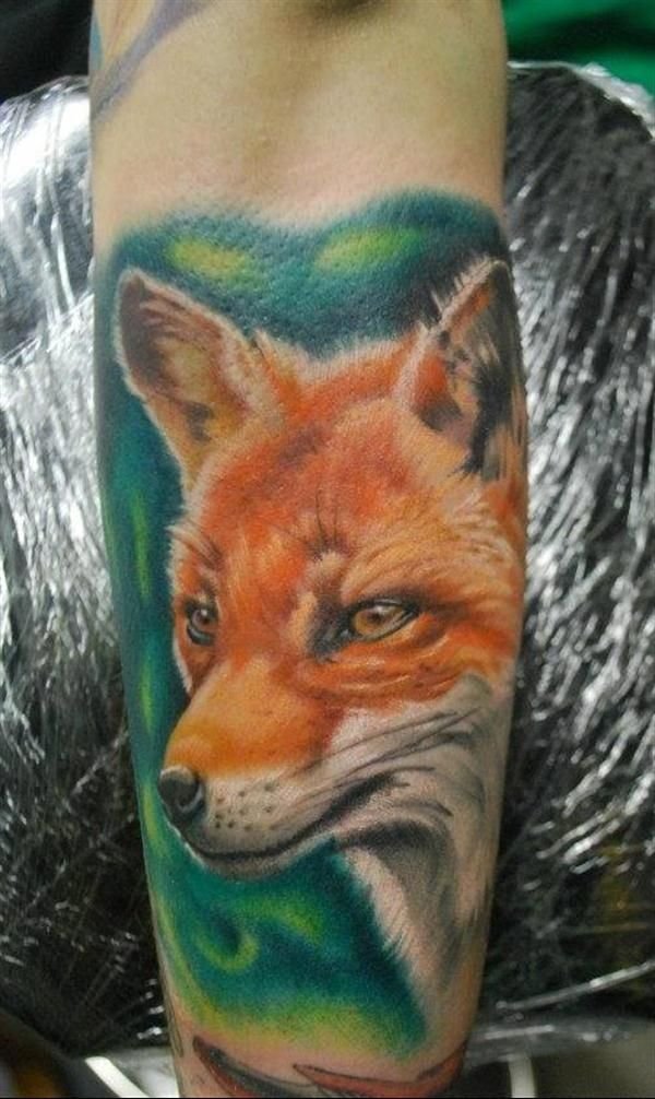 Amazing Color Ink Fox Head Tattoo On Sleeve
