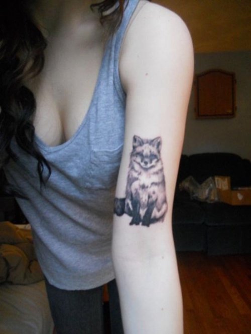 Grey Ink Fox Tattoo On Girl Left Sleeve