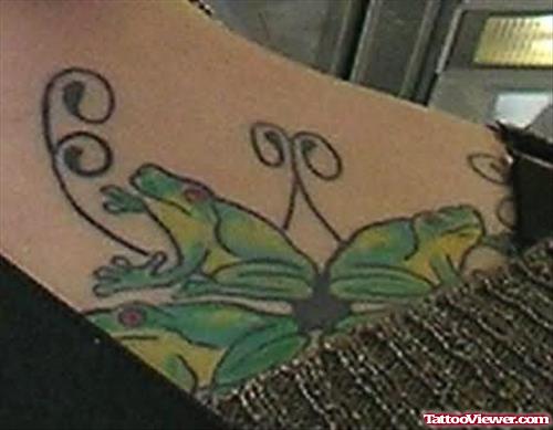 Frog In Flowers Tattoo