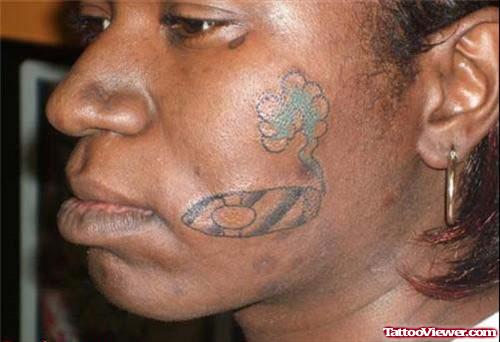 Funny Smoking Tattoo On Face