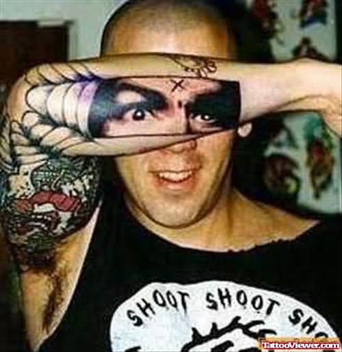 Funny Eyes Tattoo On Arm