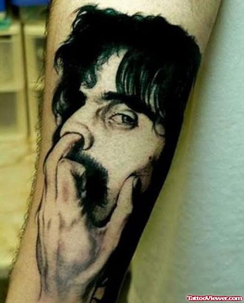 Funny Face Tattoo On Arm