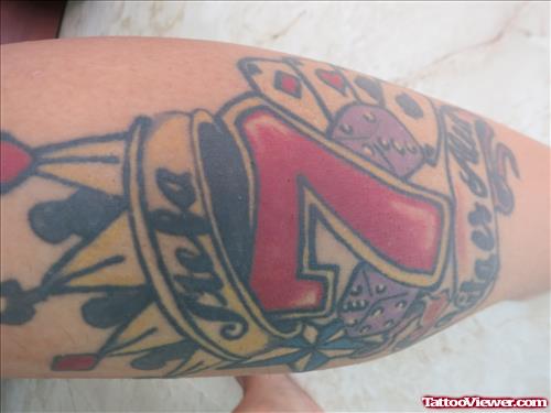 Gambling Number With Crown Tattoo On Arm