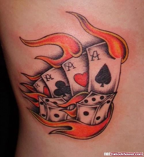Flaming Cards And Dice Gambling Tattoo On Side