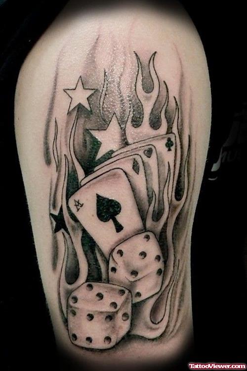 Grey Ink Flaming Cards And Dice Gambling Tattoo Design