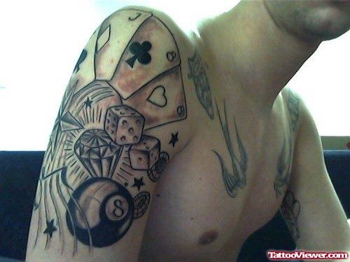 Grey Ink Dice And Cards Gambling Tattoo On Right Sleeve