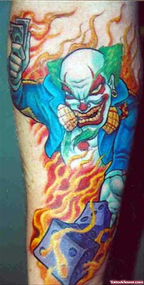 Flaming Dice And Joker Colored Gambling Tattoo On Arm