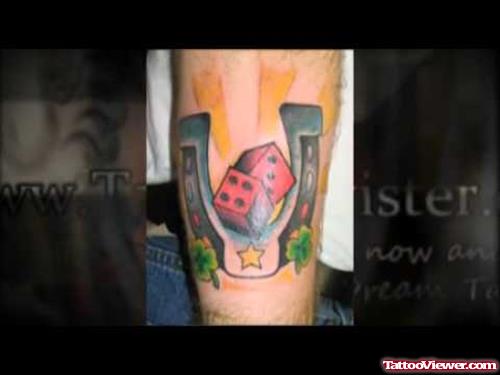 Horseshoe And Red Dice Gambling Tattoo On Arm
