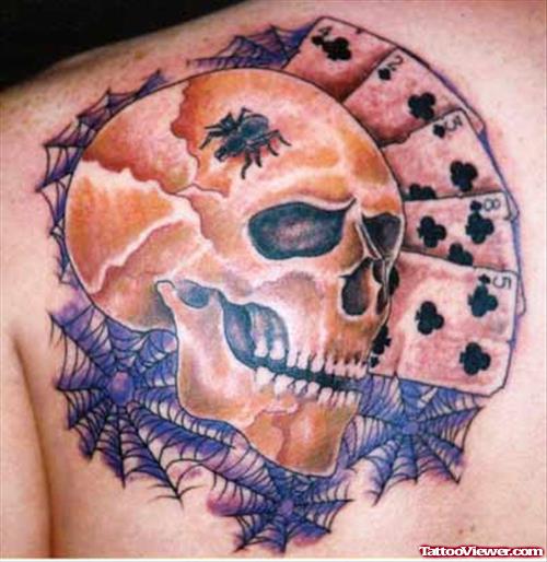 Grey Ink Skull And Cards Tattoo On Left Back Shoulder