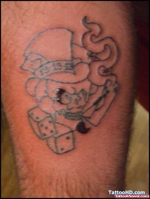 Grey Ink Smoking Skull and Dice Gambling Tattoo