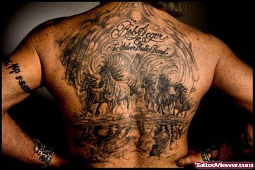 Grey Ink Gambling Tattoo On Man Back