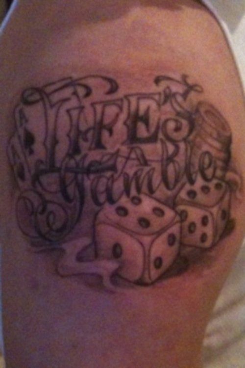 Grey Ink Dice And Gambling Tattoo On Shoulder