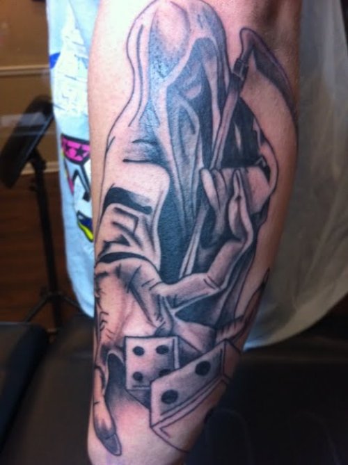 Grey Ink Dice And Grim Reaper Gambling Tattoo On Left Sleeve
