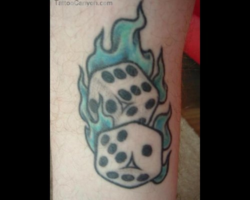 Flaming Dices Gambling Tattoo On Arm