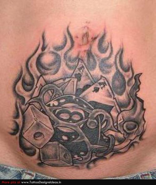 Flaming Cards And Dice Gambling Tattoo On Belly