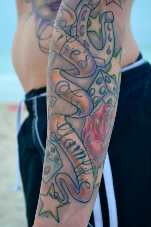 LifeвЂ™s A Gamble Tattoo On Left Sleeve