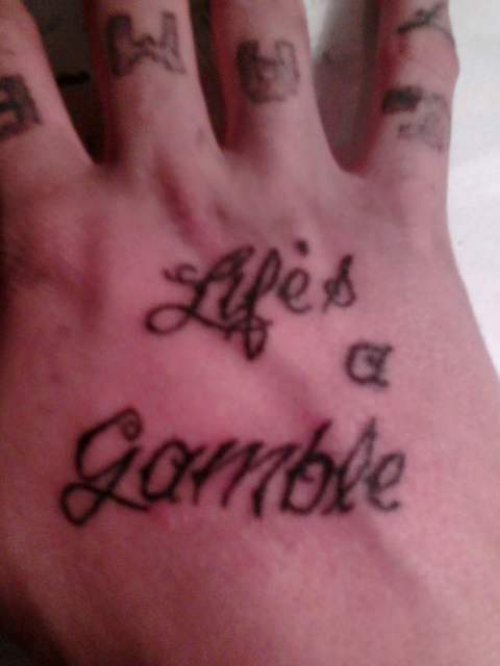 LifeвЂ™s A Gamble Tattoo On Right Hand