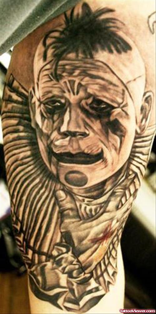 Grey Ink Clown Head Gangster Tattoo On Bicep
