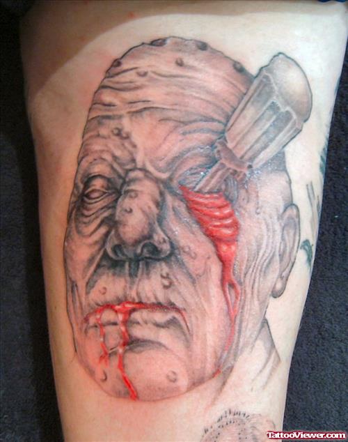 Injured Gangsta Head Tattoo On Arm