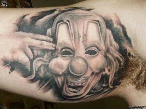 Amazing Grey Ink Clown Head Tattoo On Bicep